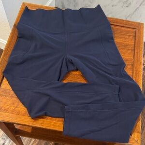 Navy Blue Athleta Salutation Stash 7/8 Leggings